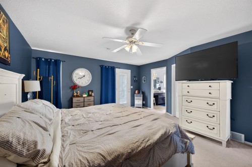 10 Willow Springs Crescent, Sylvan Lake, AB - Indoor Photo Showing Bedroom