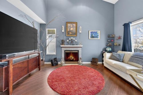 10 Willow Springs Crescent, Sylvan Lake, AB - Indoor Photo Showing Living Room With Fireplace