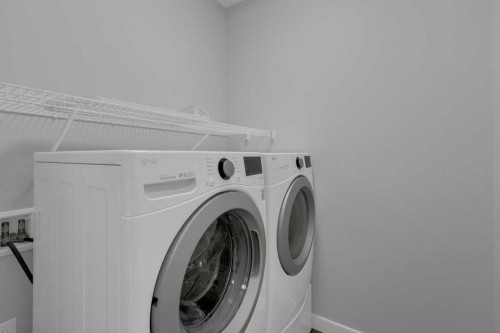137 Willow Park North, Cochrane, AB - Indoor Photo Showing Laundry Room