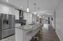 137 Willow Park North, Cochrane, AB  - Indoor Photo Showing Kitchen With Stainless Steel Kitchen With Double Sink With Upgraded Kitchen 