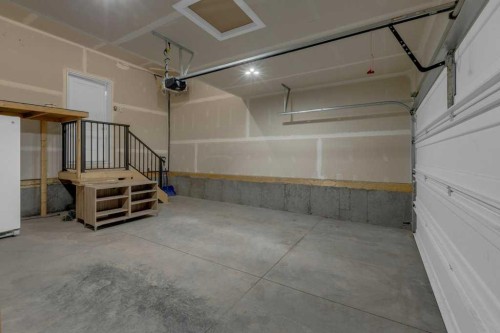 137 Willow Park North, Cochrane, AB - Indoor Photo Showing Garage