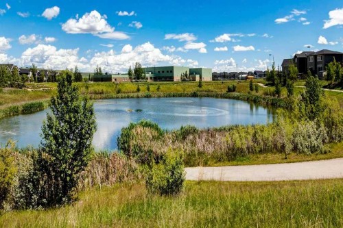 137 Willow Park North, Cochrane, AB - Outdoor With Body Of Water With View