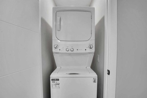 7842 21A Street Se, Calgary, AB - Indoor Photo Showing Laundry Room