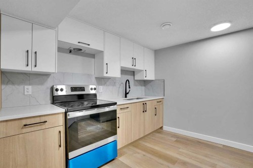 7842 21A Street Se, Calgary, AB - Indoor Photo Showing Kitchen