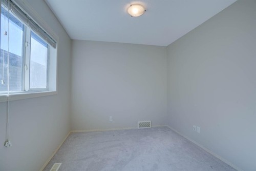 15 Tuscany Reserve Bay Nw, Calgary, AB - Indoor Photo Showing Other Room