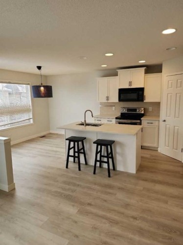 15 Tuscany Reserve Bay Nw, Calgary, AB - Indoor Photo Showing Kitchen