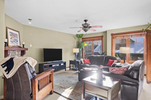 318-170 Crossbow Place, Canmore, AB - Indoor Photo Showing Living Room