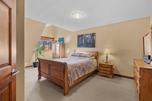 318-170 Crossbow Place, Canmore, AB - Indoor Photo Showing Bedroom
