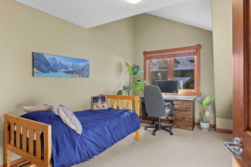 318-170 Crossbow Place, Canmore, AB - Indoor Photo Showing Bedroom
