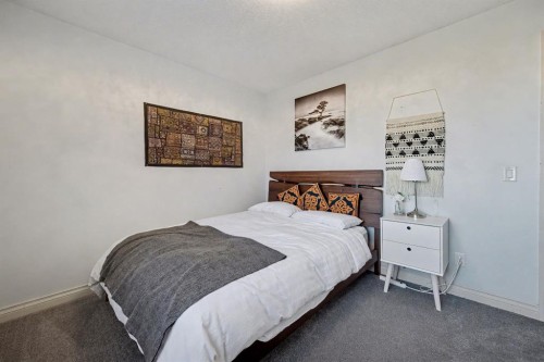 1718 High Park Drive Nw, High River, AB - Indoor Photo Showing Bedroom