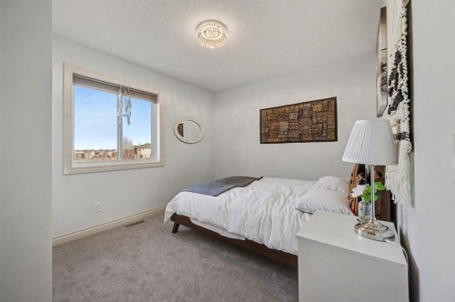 1718 High Park Drive Nw, High River, AB - Indoor Photo Showing Bedroom