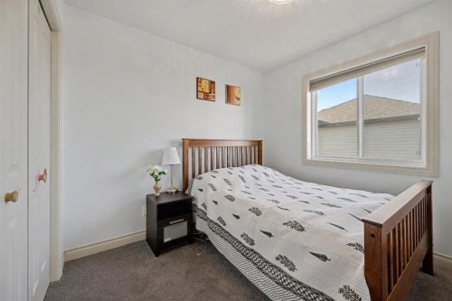1718 High Park Drive Nw, High River, AB - Indoor Photo Showing Bedroom