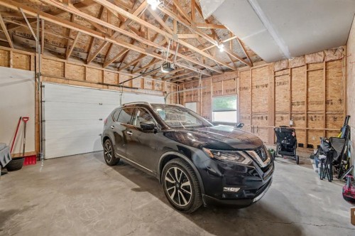 1718 High Park Drive Nw, High River, AB - Indoor Photo Showing Garage