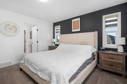 1071 Stevens Place, Crossfield, AB - Indoor Photo Showing Bedroom