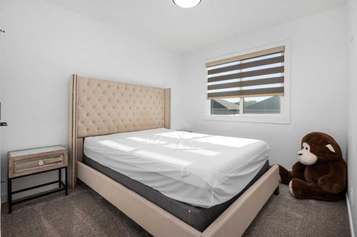 1071 Stevens Place, Crossfield, AB - Indoor Photo Showing Bedroom