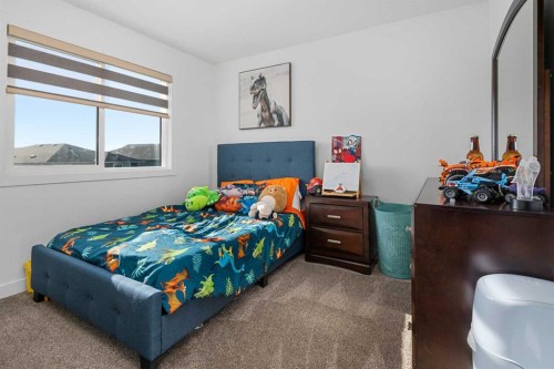 1071 Stevens Place, Crossfield, AB - Indoor Photo Showing Bedroom