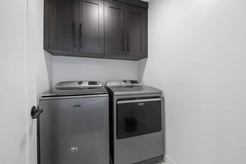 1071 Stevens Place, Crossfield, AB - Indoor Photo Showing Laundry Room