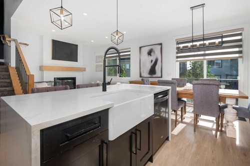 1071 Stevens Place, Crossfield, AB - Indoor Photo Showing Other Room With Fireplace