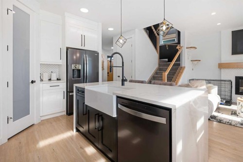 1071 Stevens Place, Crossfield, AB - Indoor Photo Showing Kitchen With Upgraded Kitchen