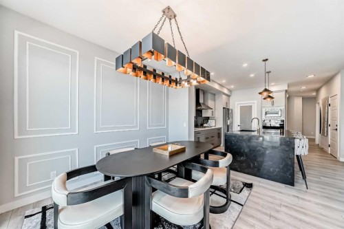 69 Amblehurst Way Nw, Calgary, AB - Indoor Photo Showing Dining Room