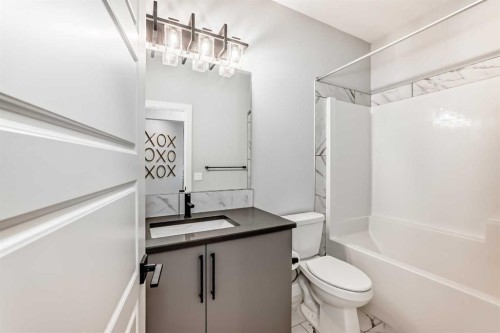 69 Amblehurst Way Nw, Calgary, AB - Indoor Photo Showing Bathroom
