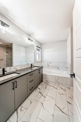 69 Amblehurst Way Nw, Calgary, AB - Indoor Photo Showing Bathroom