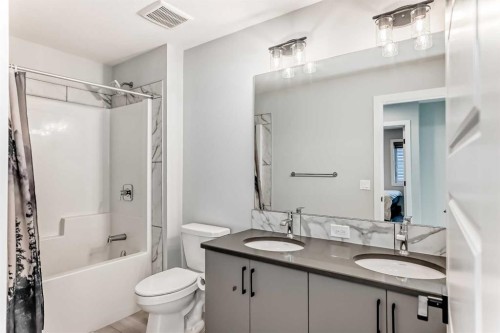 69 Amblehurst Way Nw, Calgary, AB - Indoor Photo Showing Bathroom