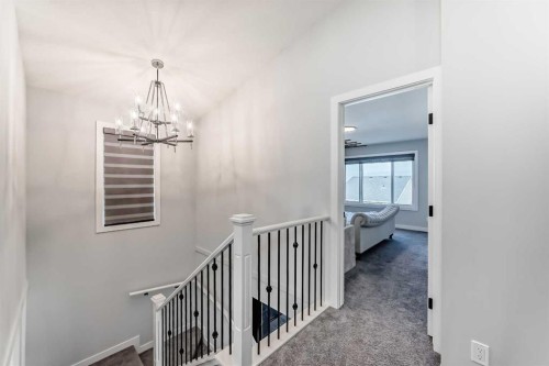 69 Amblehurst Way Nw, Calgary, AB - Indoor Photo Showing Other Room
