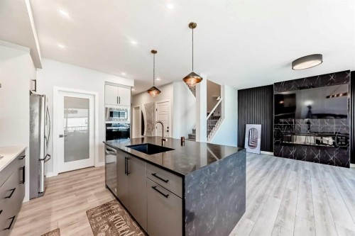69 Amblehurst Way Nw, Calgary, AB - Indoor Photo Showing Kitchen With Upgraded Kitchen