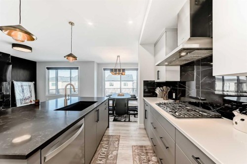 69 Amblehurst Way Nw, Calgary, AB - Indoor Photo Showing Kitchen With Upgraded Kitchen