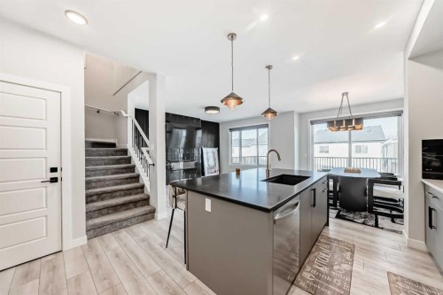 69 Amblehurst Way Nw, Calgary, AB - Indoor Photo Showing Kitchen With Upgraded Kitchen