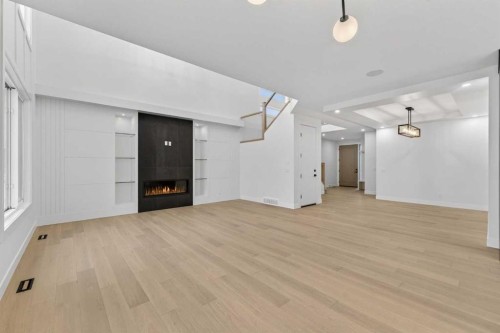 95 South Shore Road, Chestermere, AB - Indoor Photo Showing Other Room With Fireplace