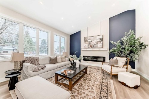1 Spruce Bank Crescent Sw, Calgary, AB - Indoor Photo Showing Living Room With Fireplace