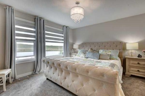 144 Cranbrook Gardens West, Calgary, AB - Indoor Photo Showing Bedroom