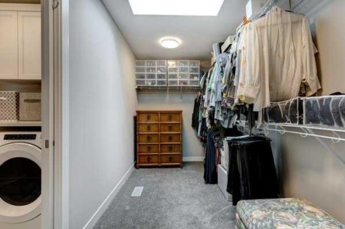 144 Cranbrook Gardens West, Calgary, AB - Indoor Photo Showing Laundry Room