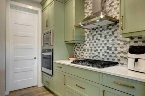 144 Cranbrook Gardens West, Calgary, AB - Indoor Photo Showing Kitchen With Upgraded Kitchen