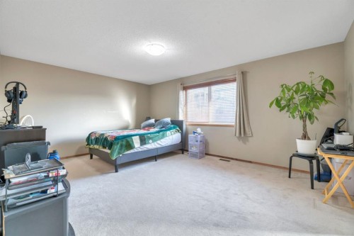98 Pantego Road Nw, Calgary, AB - Indoor Photo Showing Bedroom