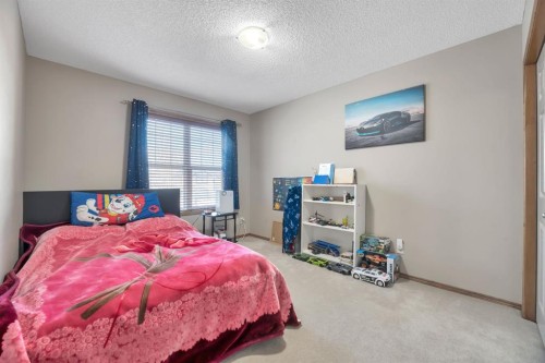 98 Pantego Road Nw, Calgary, AB - Indoor Photo Showing Bedroom
