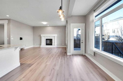 179 Panatella Cape Nw, Calgary, AB - Indoor With Fireplace