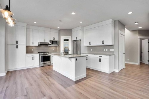 179 Panatella Cape Nw, Calgary, AB - Indoor Photo Showing Kitchen With Upgraded Kitchen