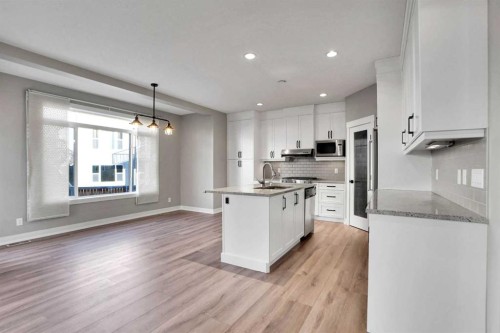 179 Panatella Cape Nw, Calgary, AB - Indoor Photo Showing Kitchen With Upgraded Kitchen