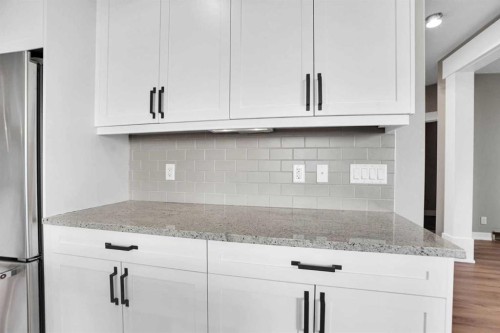 179 Panatella Cape Nw, Calgary, AB - Indoor Photo Showing Kitchen With Upgraded Kitchen