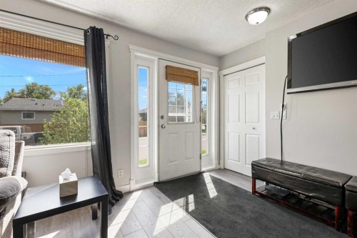 63 Olympia Crescent Se, Calgary, AB - Indoor Photo Showing Other Room