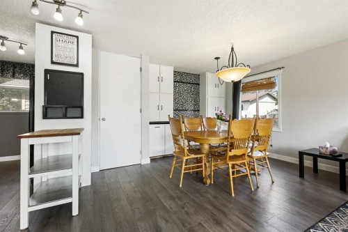 63 Olympia Crescent Se, Calgary, AB - Indoor Photo Showing Dining Room