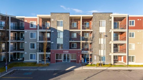 207-5 Saddlestone Way Ne, Calgary, AB - Outdoor With Balcony With Facade