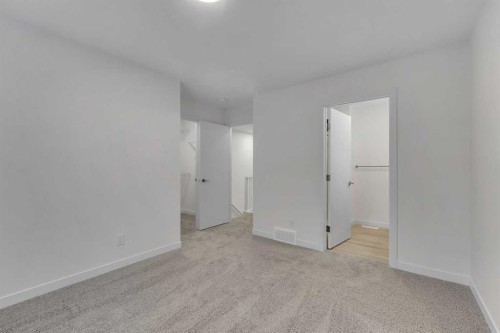 35 Heritage Heath, Cochrane, AB - Indoor Photo Showing Other Room