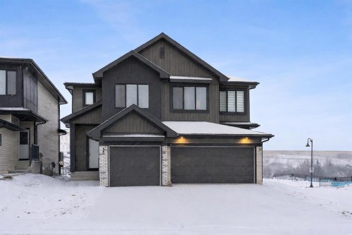 35 Heritage Heath, Cochrane, AB - Outdoor With Facade