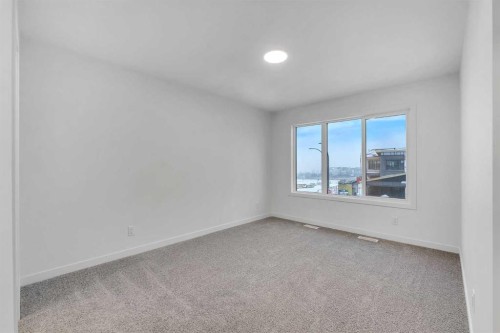 35 Heritage Heath, Cochrane, AB - Indoor Photo Showing Other Room