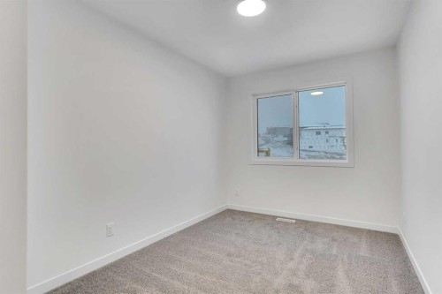 35 Heritage Heath, Cochrane, AB - Indoor Photo Showing Other Room