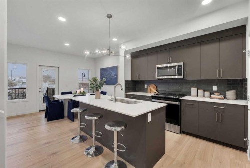 35 Heritage Heath, Cochrane, AB - Indoor Photo Showing Kitchen With Upgraded Kitchen